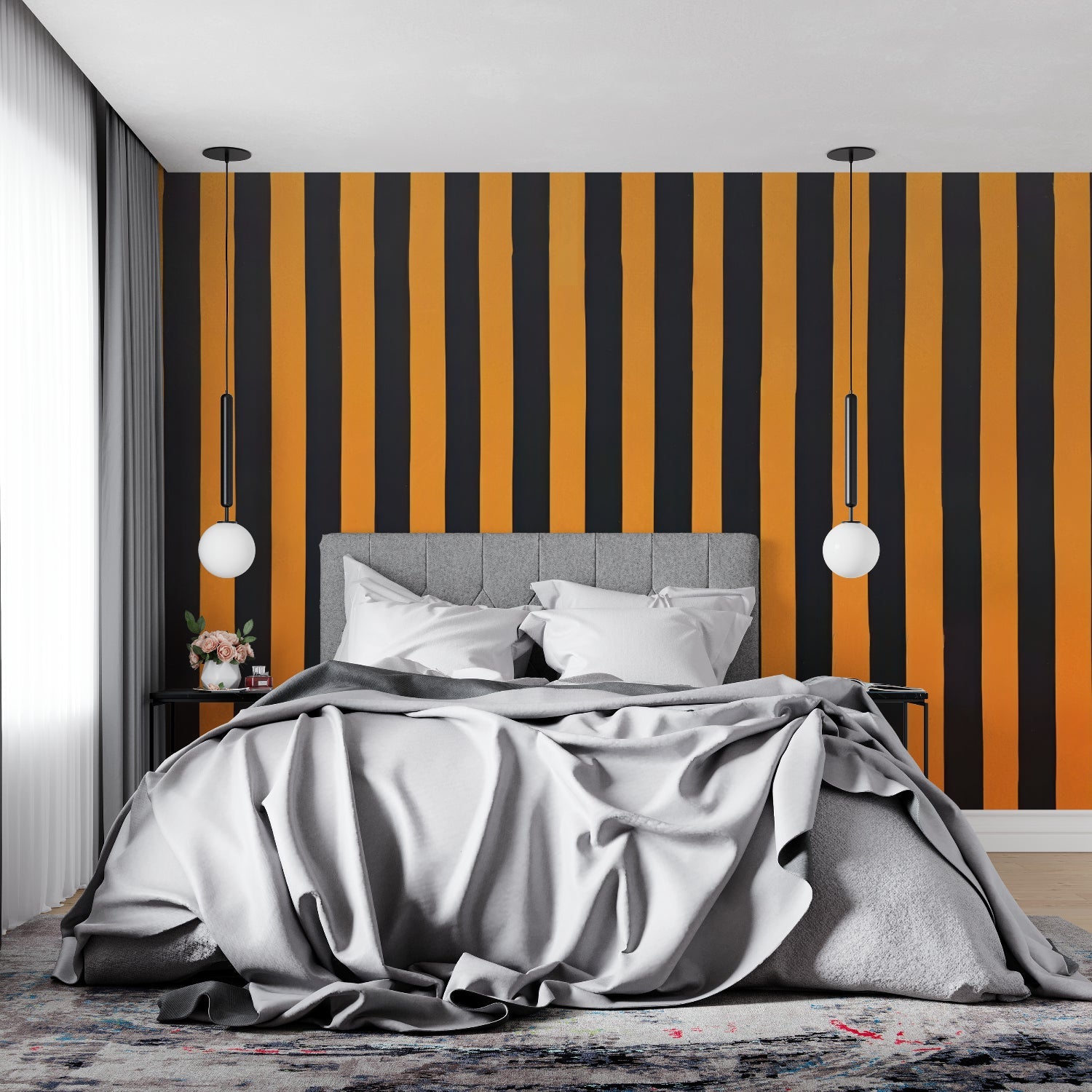 Orange and black striped wallpaper adding drama to a modern home office