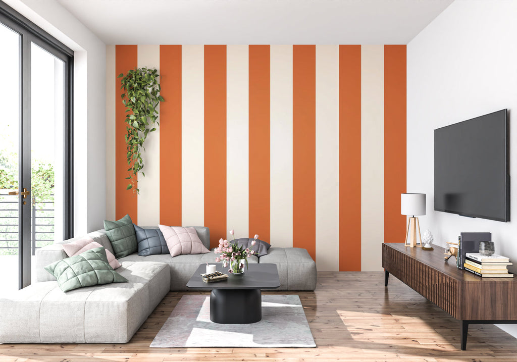 Dining room with bold orange striped wall mural adding warmth and sophistication