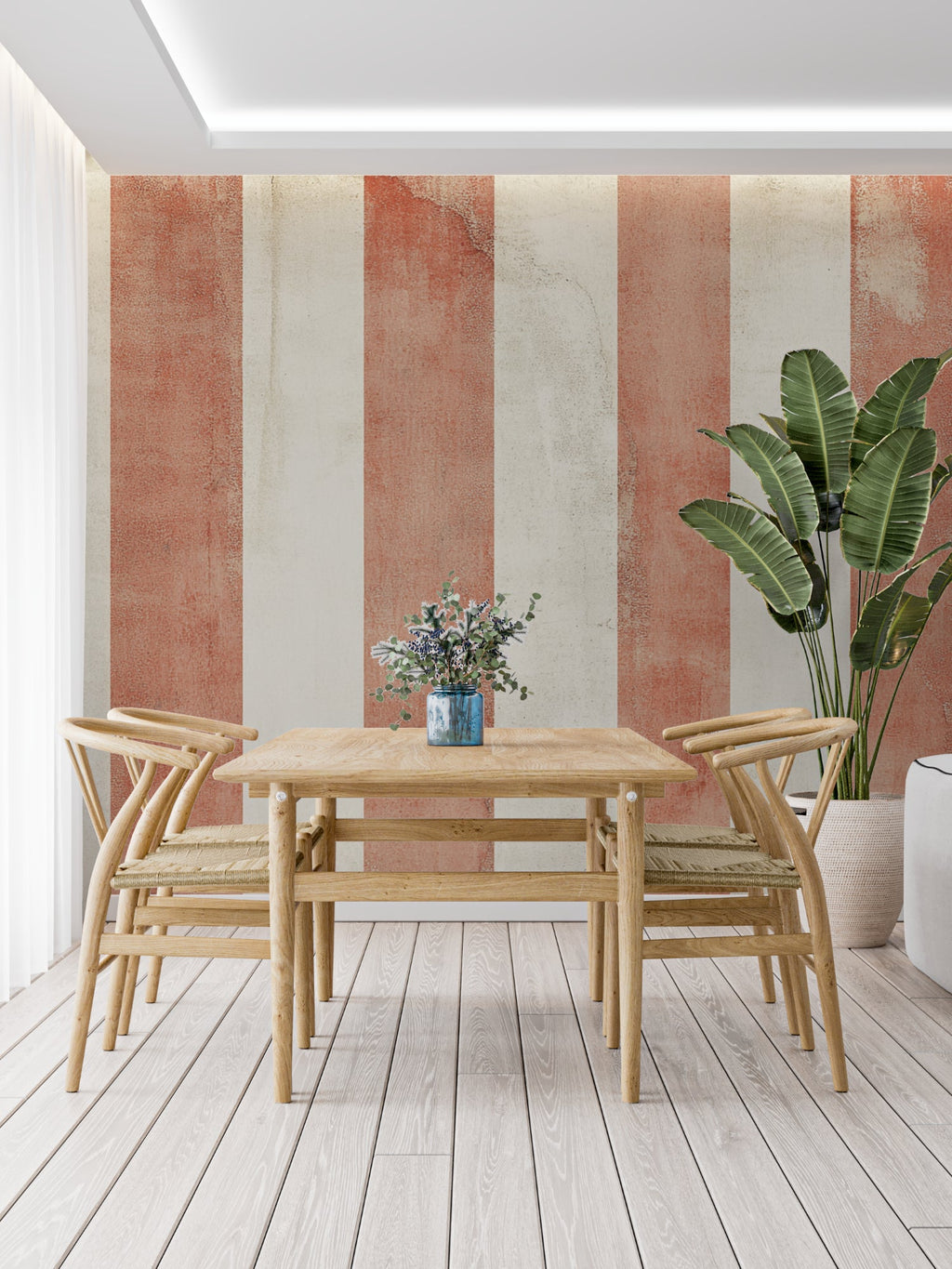 Modern dining room featuring vertical striped wallpaper in warm terracotta and cream tones