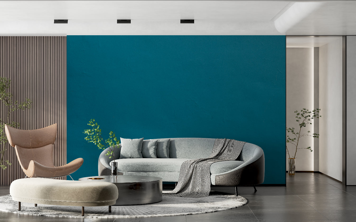 Minimalist bedroom featuring solid teal wall mural with natural light