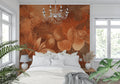 Terracotta floral wallpaper creating a warm atmosphere in a modern living room with natural light