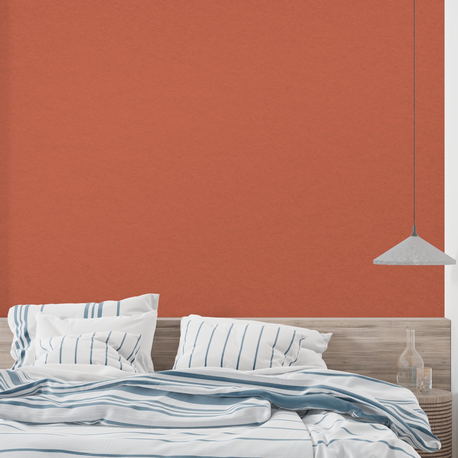 Terracotta wall design in a minimalist hallway with natural lighting