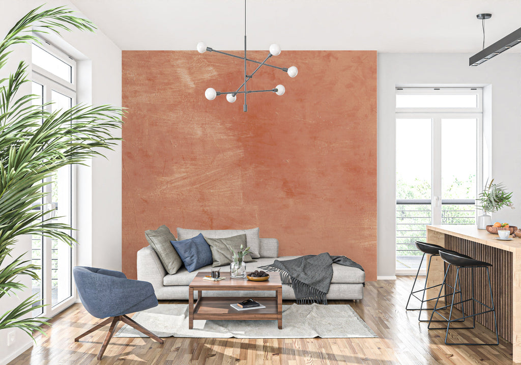 Rustic terracotta wallpaper in a cozy bedroom setting with natural light