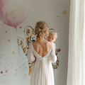 Tiger cub balloon wallpaper in a bright nursery with white furniture and soft pink accents