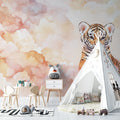 Tiger cub nursery wallpaper styled in modern white nursery with rocking chair and minimal decor