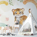 Baby tiger wallpaper creating a cozy atmosphere in a modern nursery with soft lighting