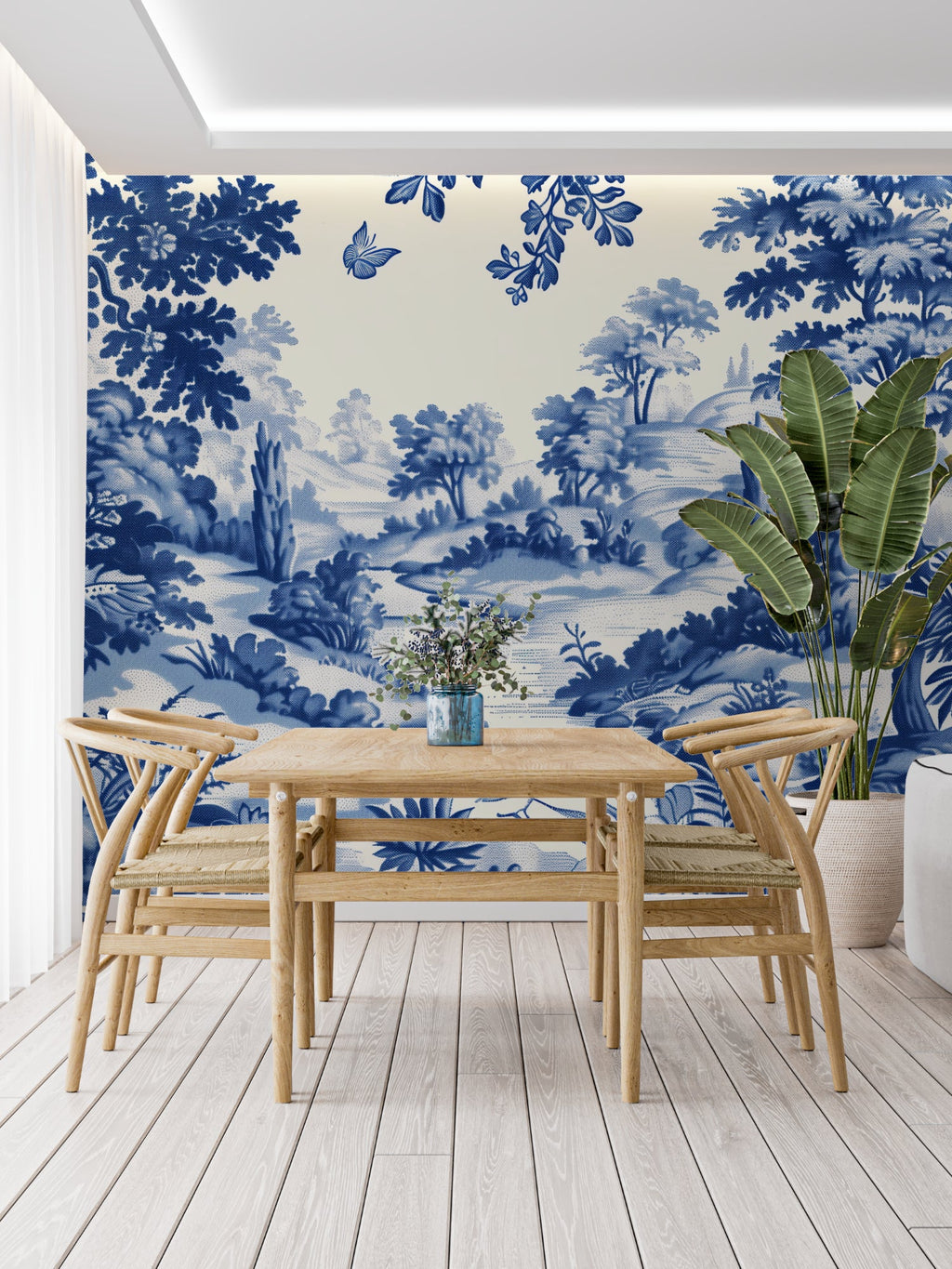 Blue pastoral scene wallpaper enhancing powder room with brass fixtures