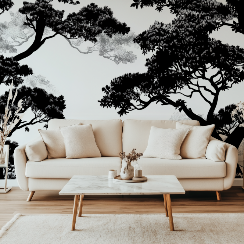 Black and white tree wallpaper creating drama in modern living room with grey sofa