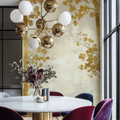Gold Tree Mural Wallpaper showcased in a modern dining room with soft lighting