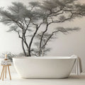 Black and white tree silhouette wallpaper design file showing intricate branch details against misty background