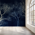 Tree branch wallpaper creating dramatic impact in modern living room with white furniture