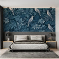 Tropical birds wallpaper in blue tones creating a peaceful atmosphere in a modern living room
