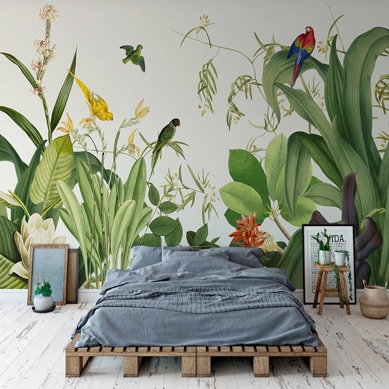 Tropical birds wallpaper creating a stunning focal point in a modern living room with natural light