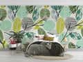 Tropical leaf wallpaper with geometric pattern brightening a modern living room with natural light