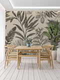 Tropical botanical line art wallpaper in a modern living room, creating an elegant focal wall with monochrome palm patterns