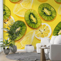 Tropical fruit wallpaper bringing fresh energy to a modern white kitchen, featuring vibrant kiwi and lemon pattern