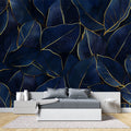 Navy and gold tropical leaf wallpaper in modern dining room showing luxury metallic details