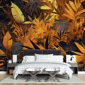 Black and gold tropical wallpaper creating depth in a modern living room with pendant lights and minimal furniture
