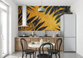 Tropical black and gold leaf wallpaper in modern living room creating luxury atmosphere