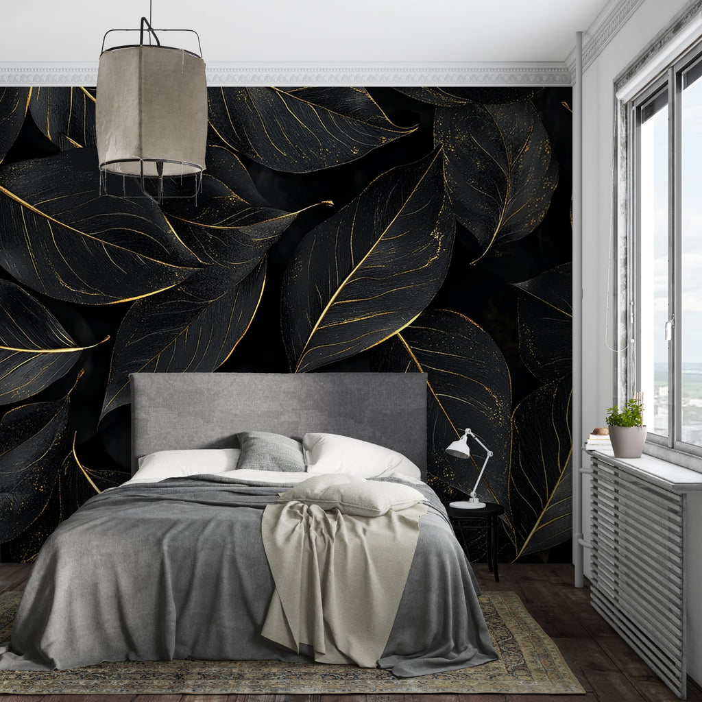 Black and gold leaf wallpaper in modern dining room with pendant lights highlighting metallic details