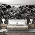 Black and white tropical palm forest mural wallpaper creating a dramatic focal point in a modern living room setting