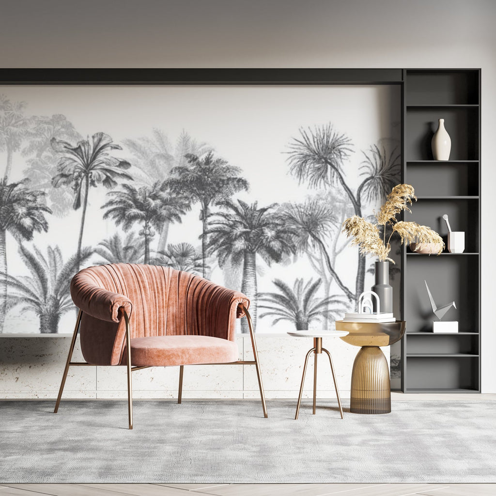 Black and white tropical palm wallpaper creating drama in a modern living room with minimalist furniture