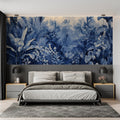 Tropical jungle wallpaper in blue creating a serene atmosphere in a modern living room