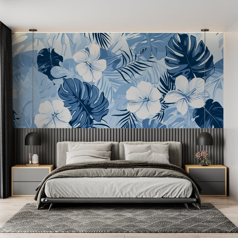 Blue Monstera wallpaper in modern living room with white sofa and natural light