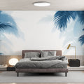 Tropical palm leaf wallpaper in modern living room showing blue palm fronds creating a fresh coastal atmosphere