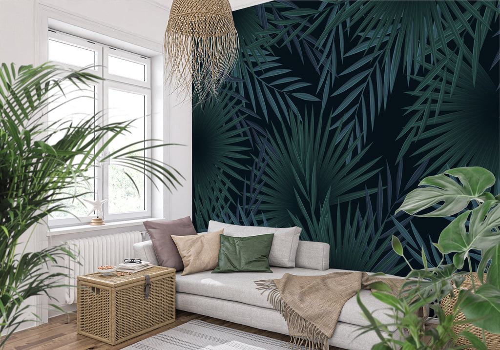 Tropical palm leaf wallpaper in modern living room creating a bold statement wall with deep green botanical pattern
