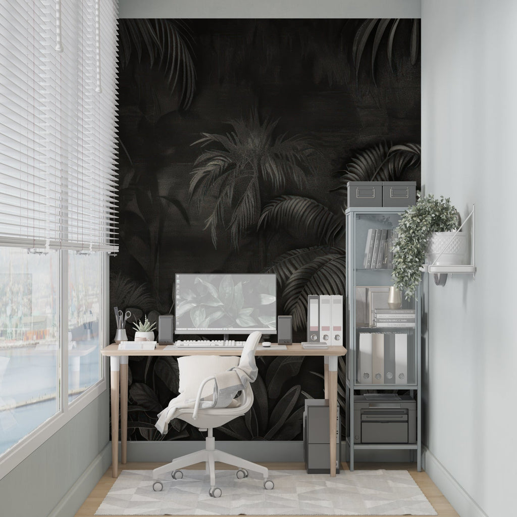 Tropical palm leaves wallpaper in modern living room with dark accent wall and minimal furniture