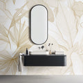 Tropical palm and monstera leaf wallpaper in beige creating a calm atmosphere in a modern living room setting