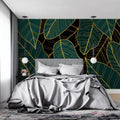 Tropical leaf wallpaper in modern living room showing emerald green and gold palm pattern