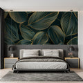 Tropical leaf wallpaper in modern living room showing emerald green and gold pattern catching natural light