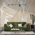 Tropical banana leaf wallpaper in gold tones creating a warm atmosphere in a modern living room setting
