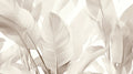 Tropical palm leaf wallpaper in modern living room creating a calm, sophisticated atmosphere