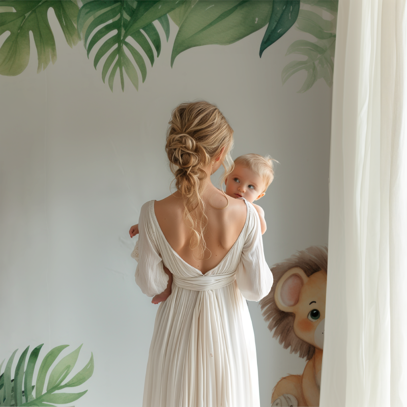 Kids bedroom featuring lion and monstera leaf wallpaper bringing jungle adventure feel