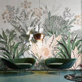 Modern Tropical Botanical Wallpaper in bright living room setting with white sofa and natural light