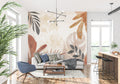 Tropical leaf wallpaper in modern living room, terracotta and beige tones create warm atmosphere