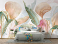 Tropical palm leaves wallpaper with gold accents creating a peaceful atmosphere in a modern living room