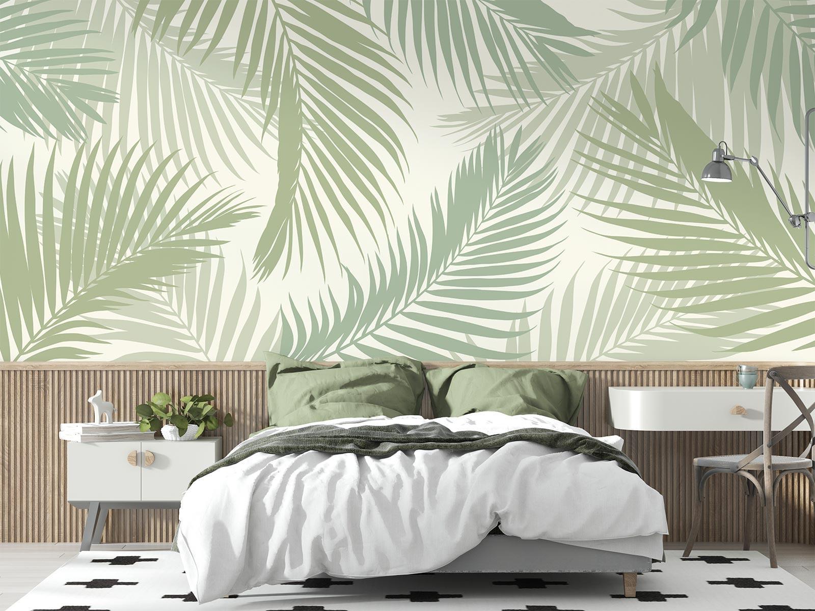 Tropical palm leaf wallpaper in sage green creating a peaceful atmosphere in a modern living room