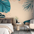 Tropical leaf wallpaper with teal Monstera pattern creating a calm atmosphere in a modern living room with natural light