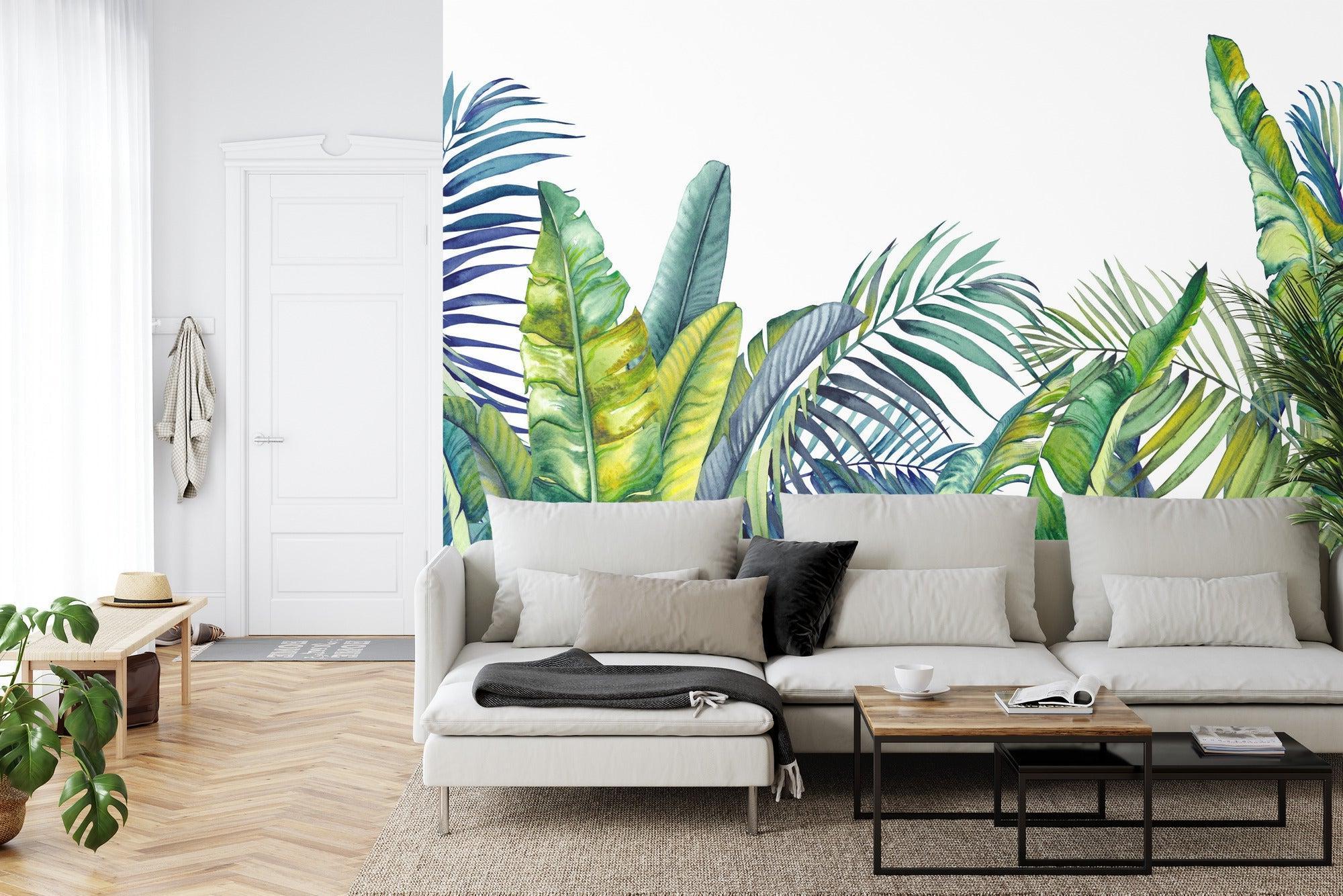 Tropical leaf wallpaper creating a fresh mood in modern living room with white furniture