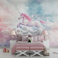 Pink unicorn wallpaper creating magic in a bright girl's bedroom with white furniture