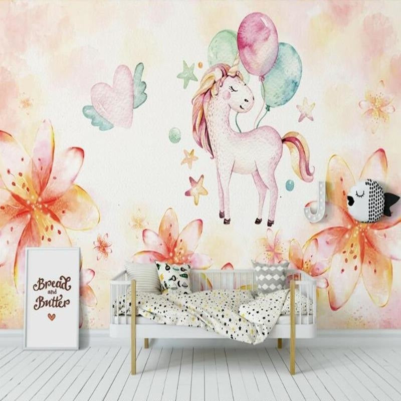 Girl's bedroom featuring unicorn wall mural, showcasing the dreamy pink and mint color palette