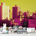 Modern city skyline wallpaper in a spacious living room, showing urban mural against white furniture