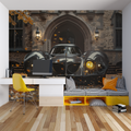 Classic car wallpaper bringing sophistication to a modern living room with black and gold accents