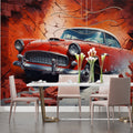 Vintage car wallpaper bringing drama to modern office space with red classic auto breaking through brick wall