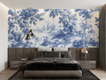 Blue and white Toile de Jouy wallpaper in a bright dining room with classic furniture
