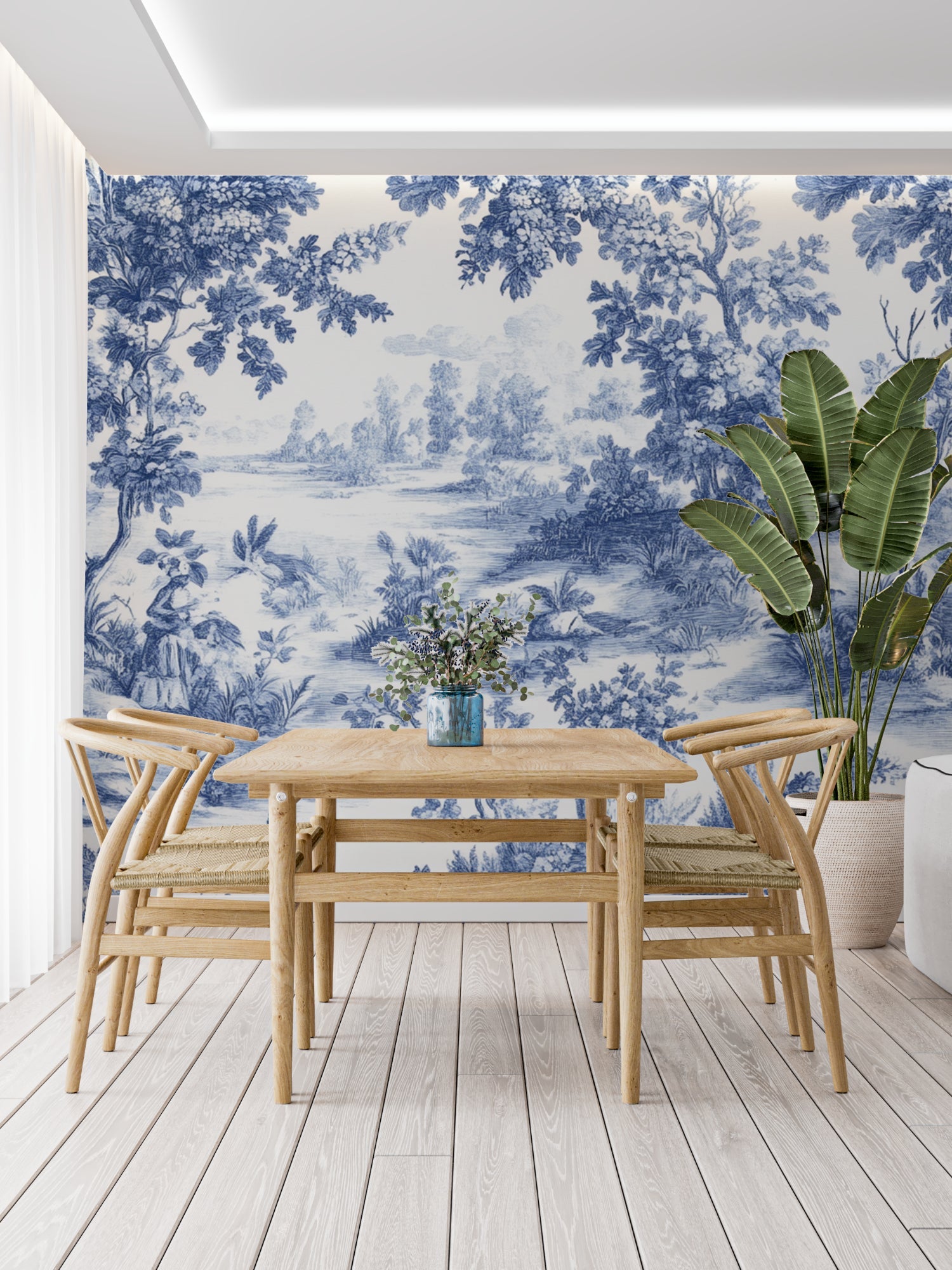 Classic blue Toile de Jouy wallpaper making a statement in an entryway